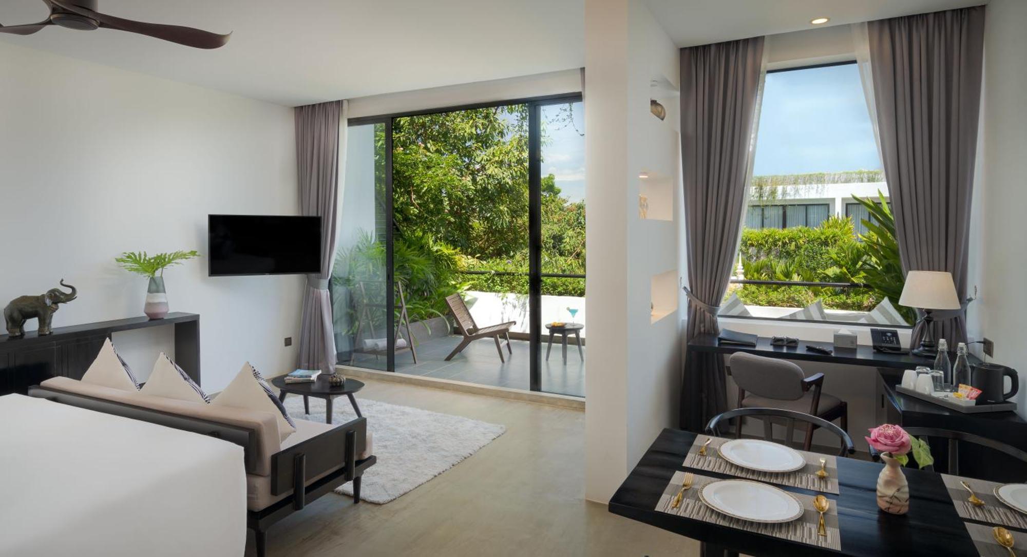 סיאם ריפ Eightfold Urban Resort מראה חיצוני תמונה A living room at the hotel